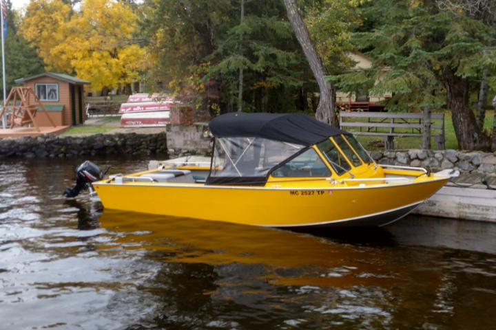 a small boat in a body of water